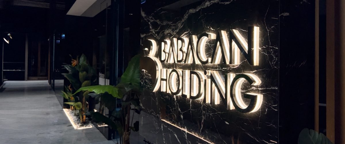 Family with son walking on field on wind farm. Happy Family and